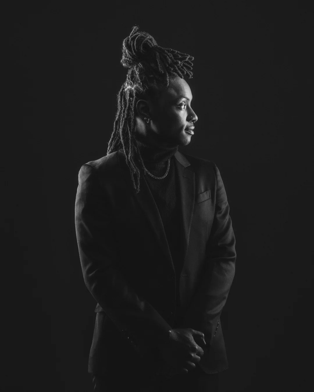 Black-and-white profile portrait of Roseyanna The Poet